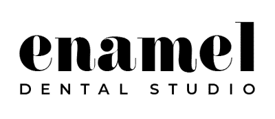 The logo for emanuel dental studio.